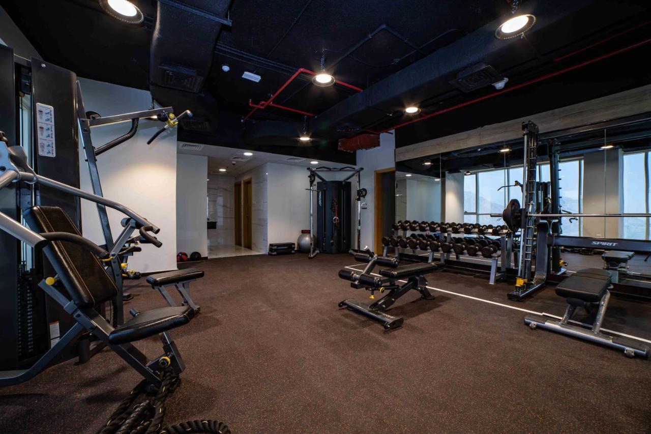Platinum Coast Hotel Apartments フジャイラ エクステリア 写真 The gym at the 100000 sq ft (9,300 sq m) headquarters of the company in Hyderabad, India