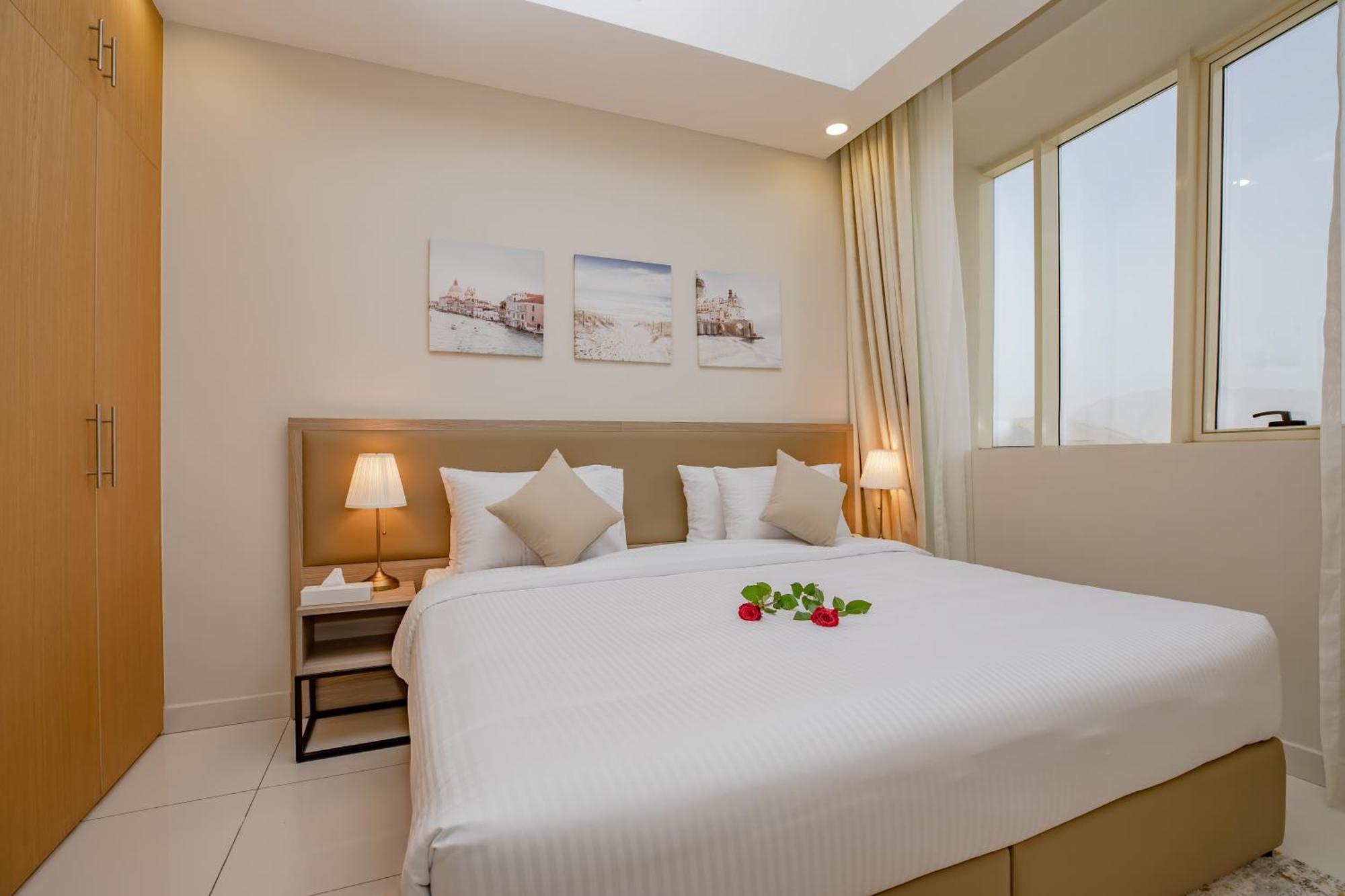 Platinum Coast Hotel Apartments フジャイラ 部屋 写真 A bedroom in a hotel